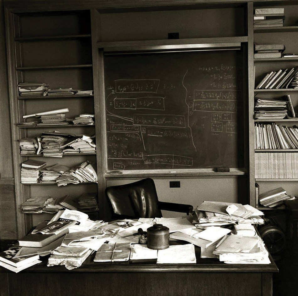 The desk of Albert Einstein, photographed immediately after his death and featuring his unfinished manuscripts of the Unified Field Theory, a.k.a. The Theory of Everything, which aspired to summarize all the physical forces in the universe.